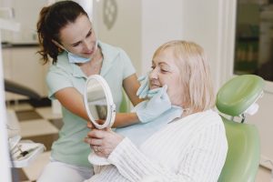 How Dental Implants and Teeth Cleaning Support Oral Hygiene